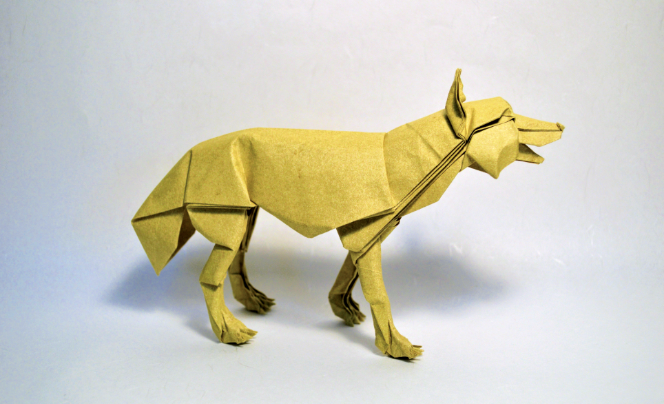 Origami Gray Wolf designed by Shuki Kato, folded by Shuki Kato, using Elephant Hide paper (Chamois)