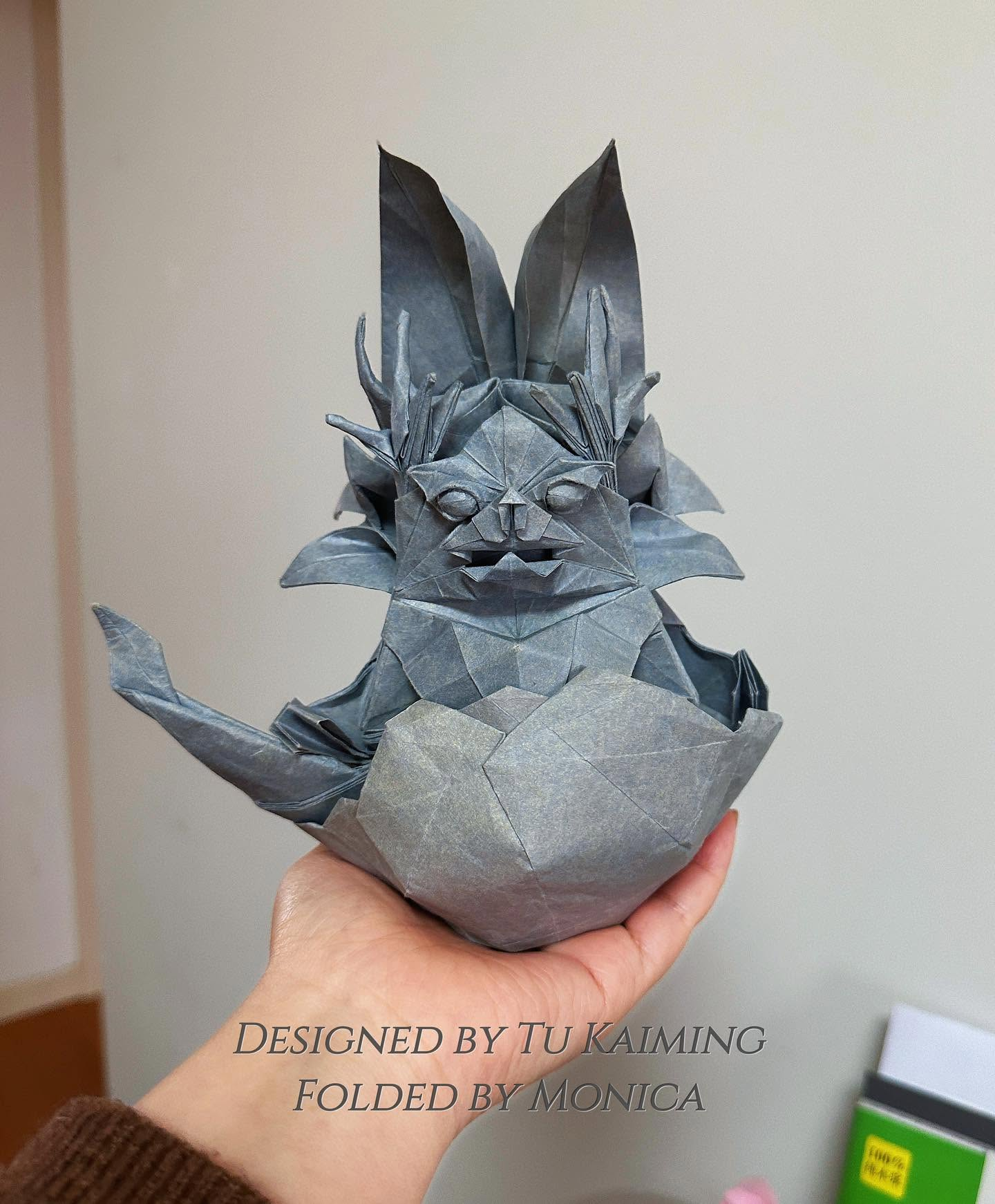 Fantasy creature sitting in an eggshell
