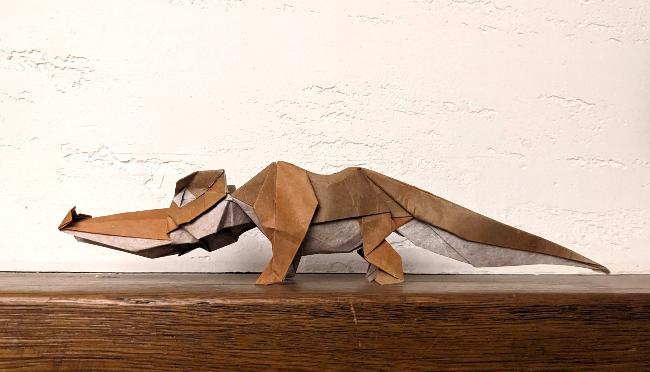 Origami Crocodile designed by TERRY Nicolas, folded by TERRY Nicolas, using Luminous Thai paper (#22 WHITE / BROWN)