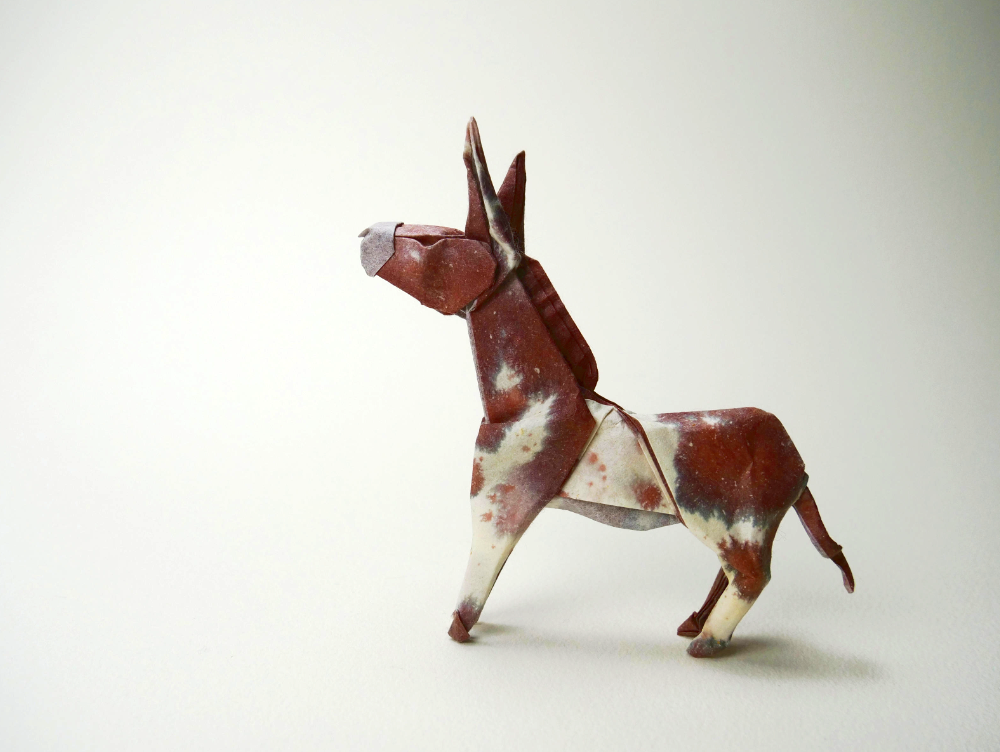 Origami Donkey designed by Daniel Chang, folded by Daniel Chang, using Luminous Thai paper (#17 WHITE / BROWN WHITE)