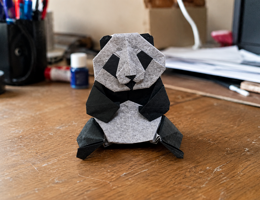 Origami Panda designed by Jeong Jae Il, folded by TERRY Nicolas, using Luminous Thai paper (#01 WHITE / BLACK BROWN)