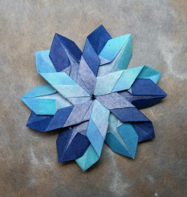 Origami Star designed by Daniel Chang, folded by Daniel Chang, using Luminous Thai paper (#16 WHITE / LAGOON BLUE)