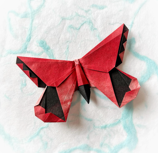 Origami Arabesque Butterfly designed by Michael LaFosse, folded by Origami by Sophie, using Shadow Thai paper (#14 BLACK / RED WHITE)