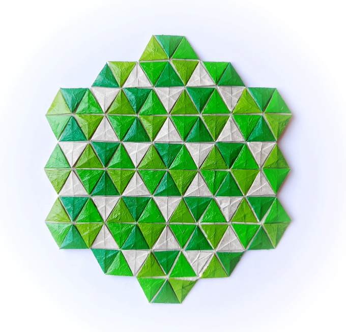 Origami Triangle Twists Flagstone Tessellation designed by Shuzo Fujimoto, folded by Origami by Sophie, using Vintage paper (Painted with acrylics)