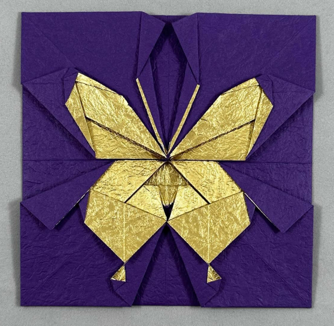 Origami Butterfly "Dancing in the book" designed by Scientific Akita, folded by Reinehr Anita, using Washi Deluxe paper (Violet / Gold)