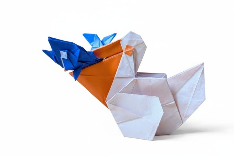 Origami Pelican designed by Syn / Jiahui Li, folded by LANDREIN Philippe, using Duo Extra Large paper (#09 Orange)