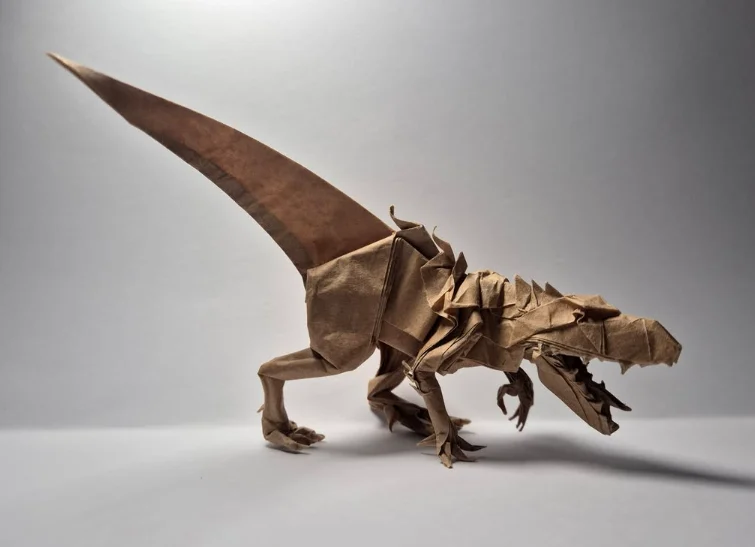 Origami Indominus Rex designed by Jason Ku, folded by Caranthir, using Kraft paper