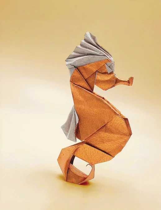 Origami Seahorse designed by SYN (Jiahui Li - 李嘉辉), folded by SYN (Jiahui Li - 李嘉辉), using Tissue-foil paper (COPPER)