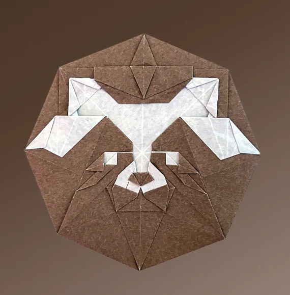 Origami Raccoon Coin designed by Wang Shuo, folded by Wang Shuo