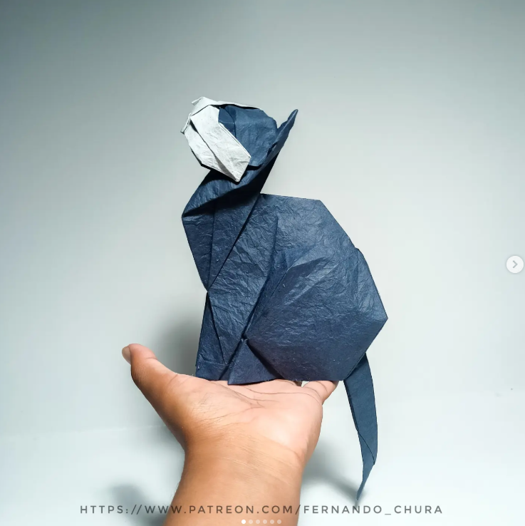 Origami Cat designed by CHURA HUANCA Fernando, folded by Chura Huanca Fernando, using Yukogami paper (#09 Blue /White)