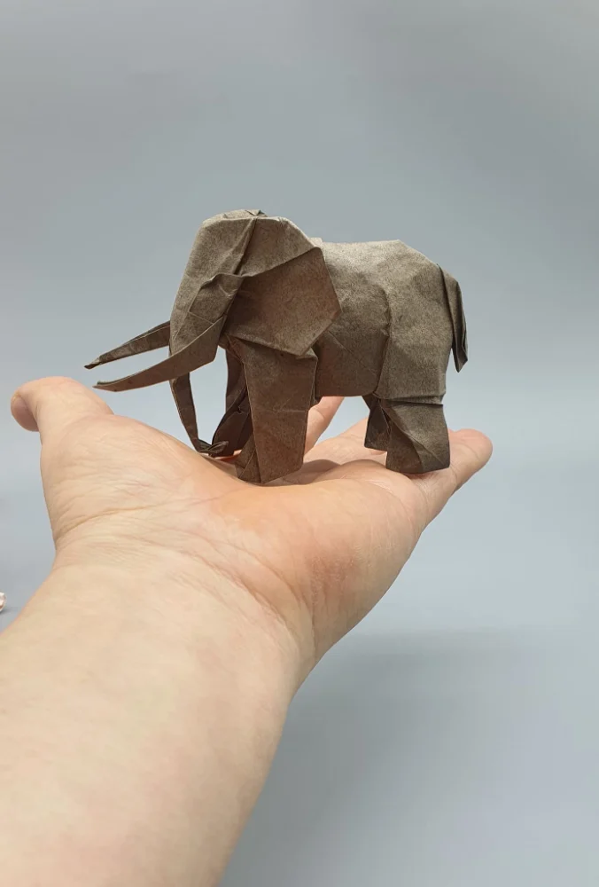 Origami Elephant designed by Red Paper - Wonseon Seo, folded by Red Paper - Wonseon Seo, using Youjeji paper (Dark Brown)