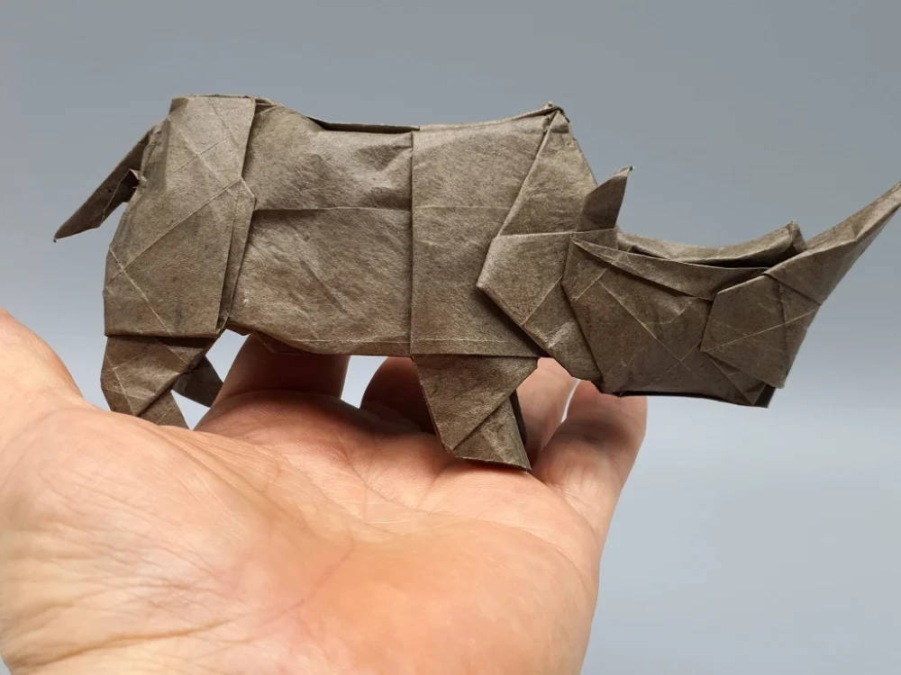 Origami Rhinoceros designed by Red Paper - Wonseon Seo, folded by Red Paper - Wonseon Seo, using Youjeji paper (Dark Brown)