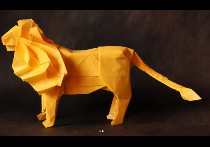 Origami Lion designed by Kamiya Satoshi, folded by @kruzliakr, using Tissue-foil paper (YELLOW)