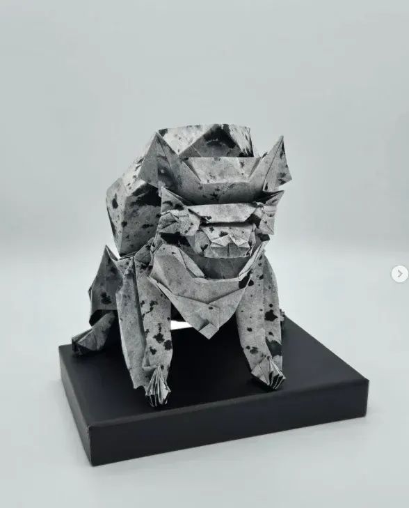 Origami Chinese Stone Lion designed by Tu Kaiming, folded by calerodriguezchristian, using Shadow Thai paper (#20 BLACK / WHITE WITH BLACK SPOTS)