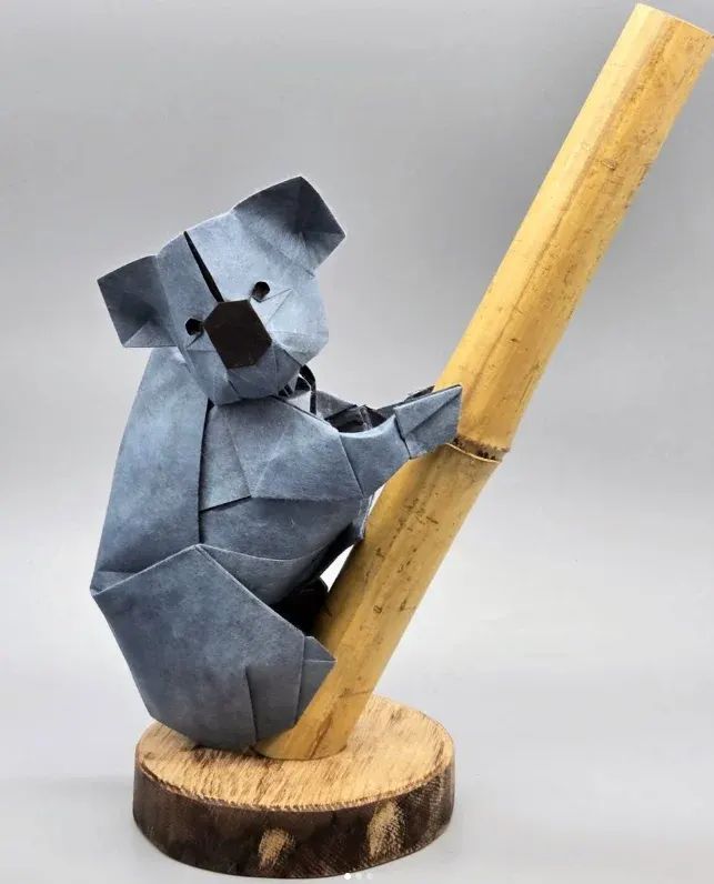 Origami Koala designed by Gen Hagiwara, folded by calerodriguezchristian, using Shadow Thai paper (#07 BLACK / BLUE GREY)