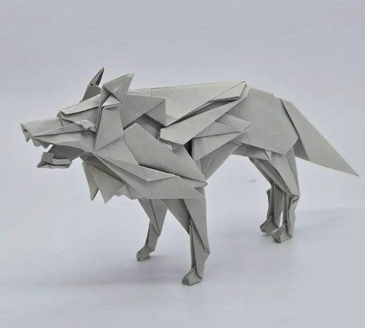 Origami Wolf designed by Tu Kaiming, folded by calerodriguezchristian, using Biotope paper (#02 Stone Gray)