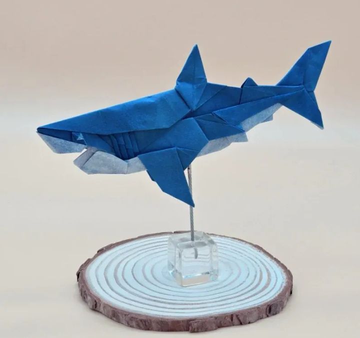 Origami Shark designed by Tu Kaiming, folded by calerodriguezchristian, using Luminous Thai paper (#04 WHITE / BLUE JEAN)