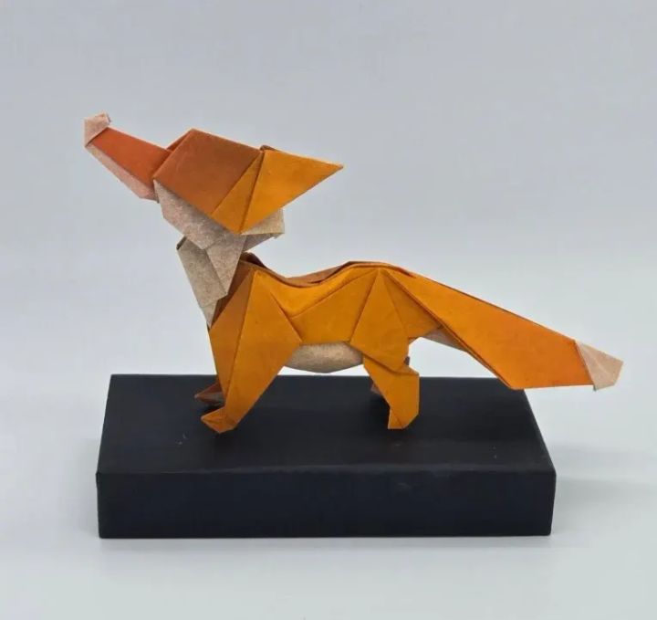 Origami Fox designed by TERRY Nicolas, folded by calerodriguezchristian, using Luminous Thai paper (#08 White / Sienna Orange)
