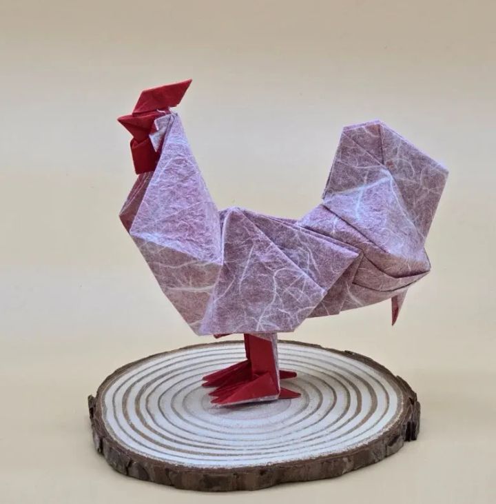 Origami Rooster designed by Tu Kaiming, folded by calerodriguezchristian, using Duo Thai paper (WHITE/RED)